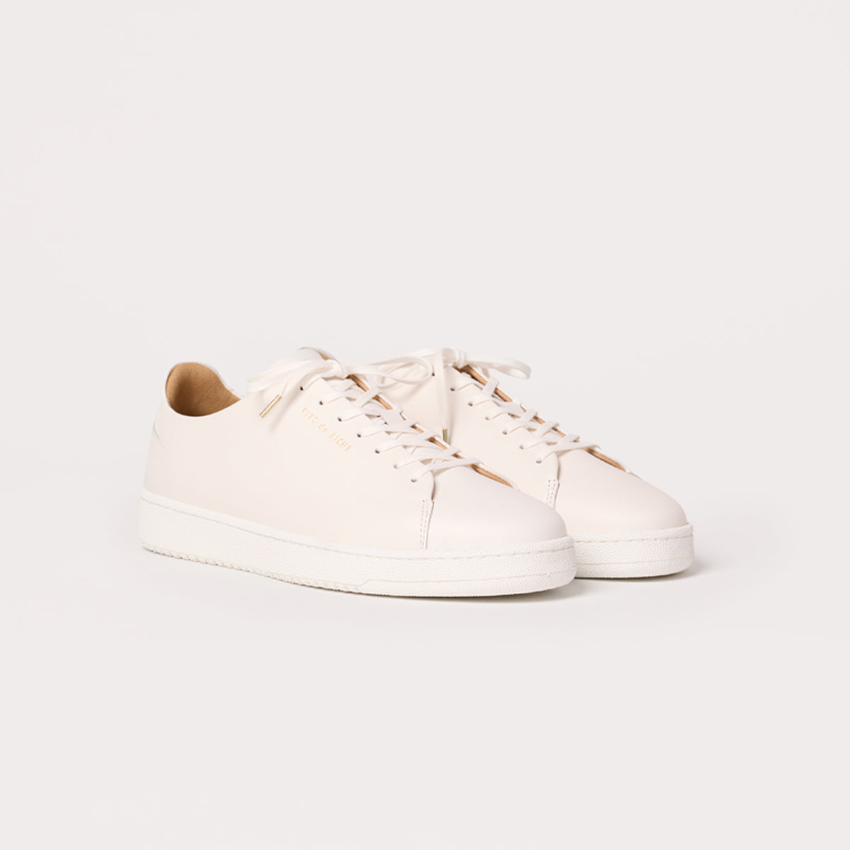 sneakers en cuir lisse blanc pour homme